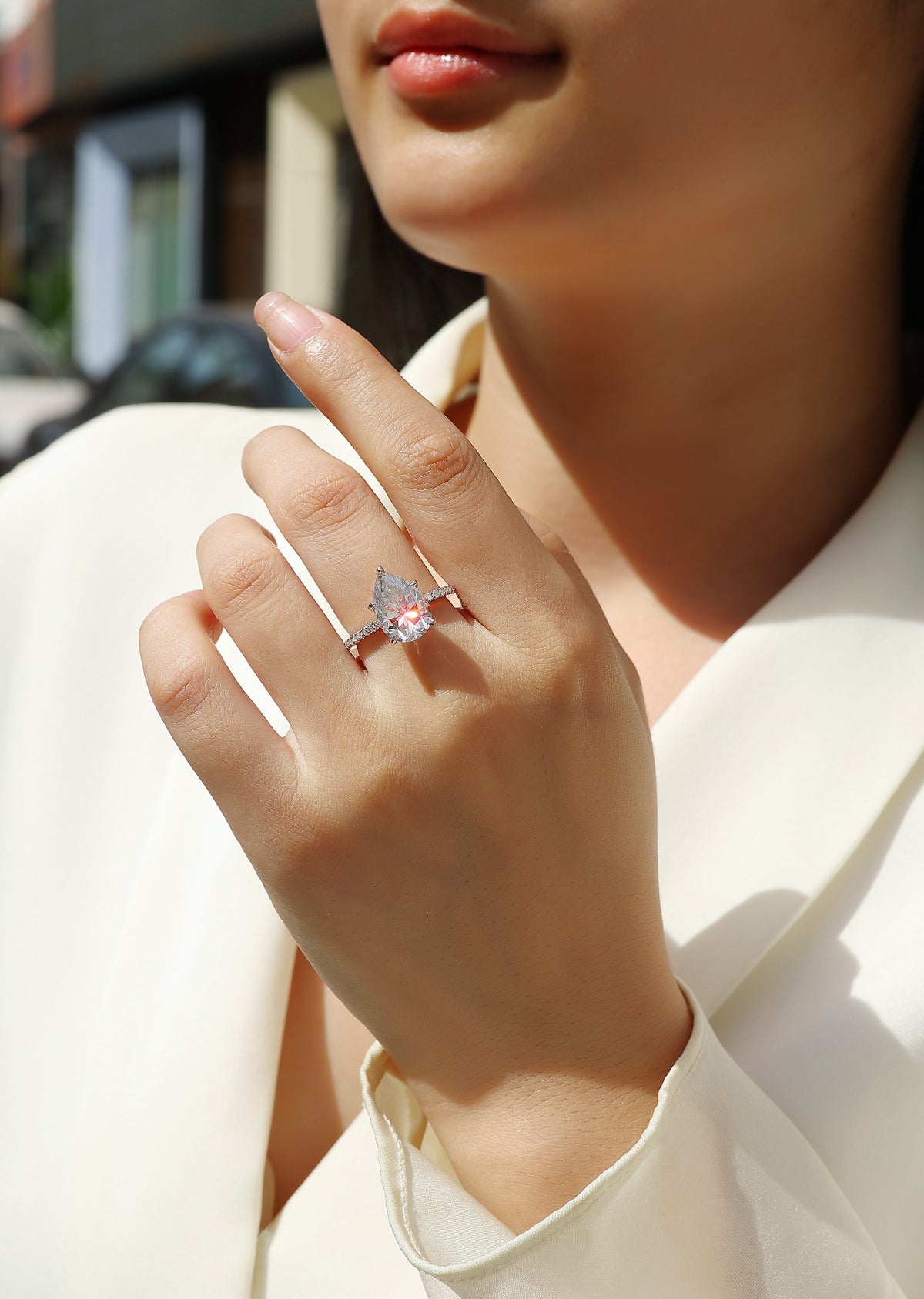 Pear Moissanite Hidden-Halo Solitaire Ring in 925 Sterling Silver - worn