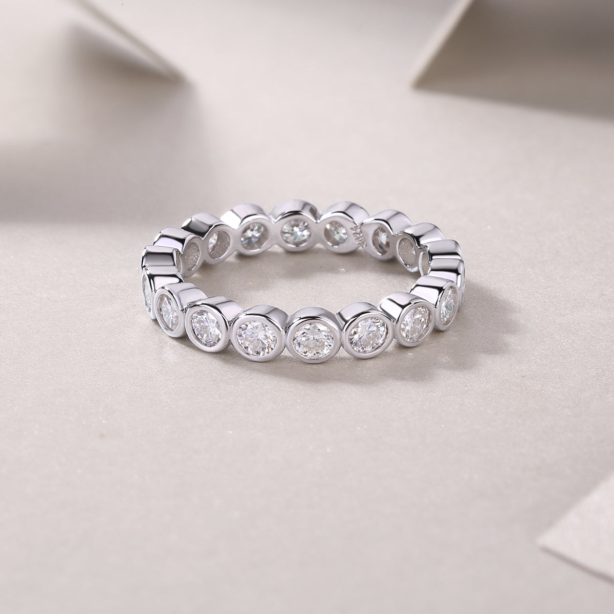 Round Moissanite Bezel-Set Eternity Band in 925 Sterling Silver
