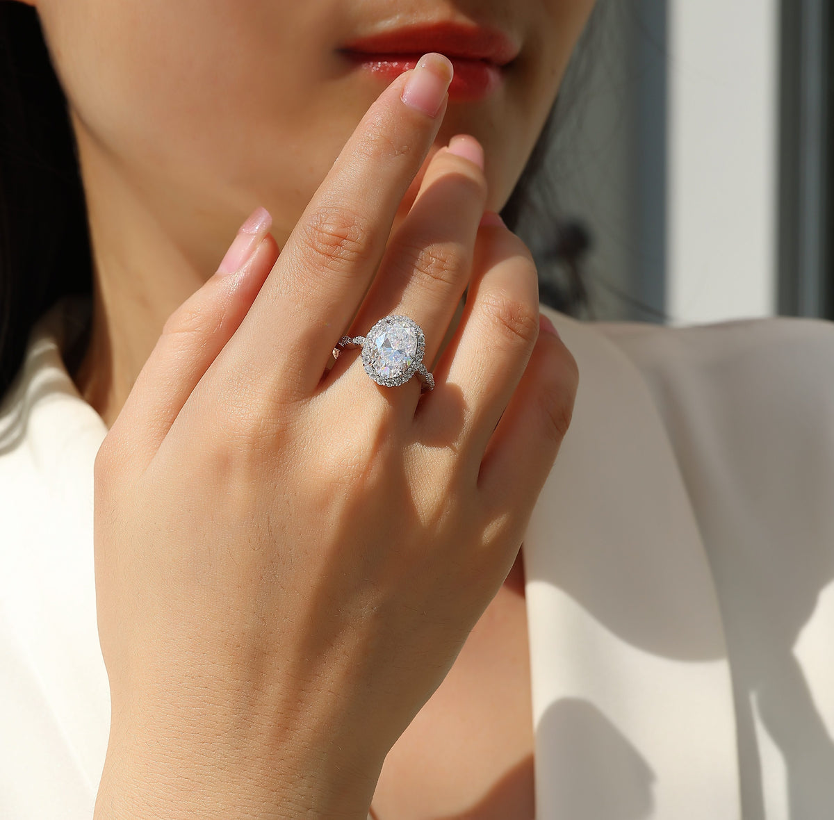 Oval Moissanite Halo Ring with Twisted Pave Band in 925 Silver - worn