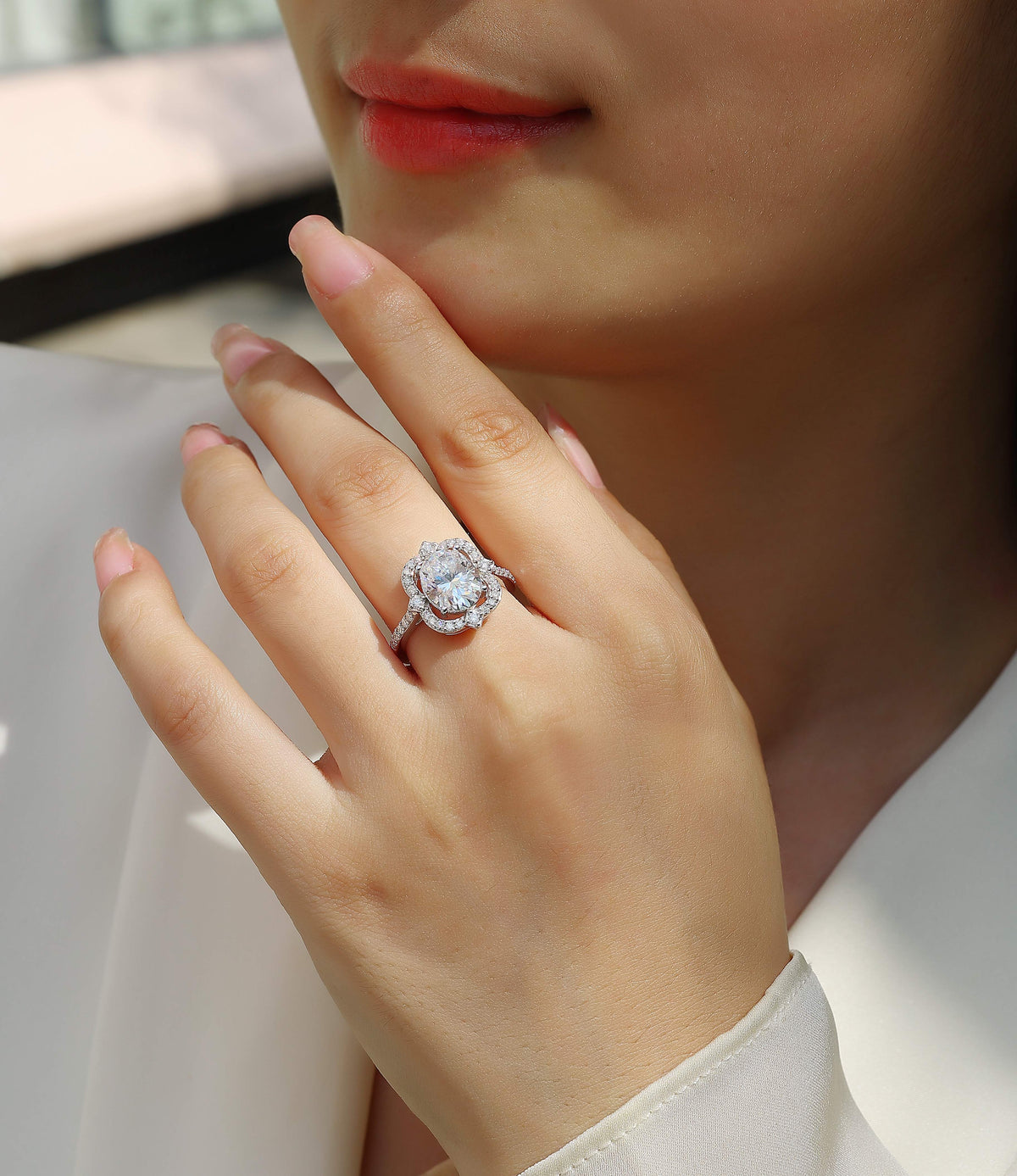 Oval Moissanite Ring with Floral Pave Halo in 925 Sterling Silver - worn