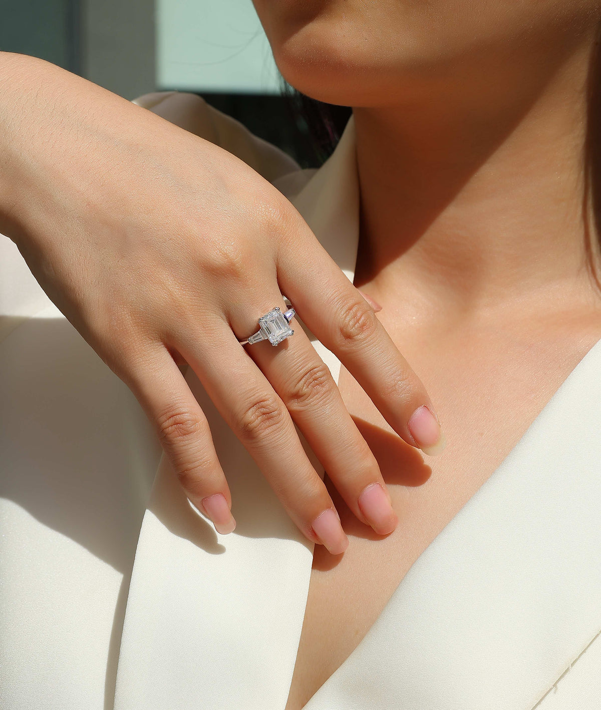Emerald-Cut Moissanite Ring with Tapered Baguettes in 925 Silver - worn