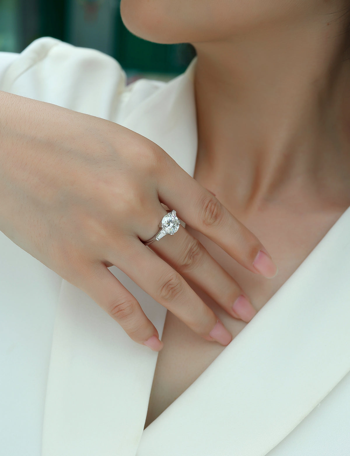 Round Moissanite Three-Stone Ring with Baguette Sides in 925 Silver - worn