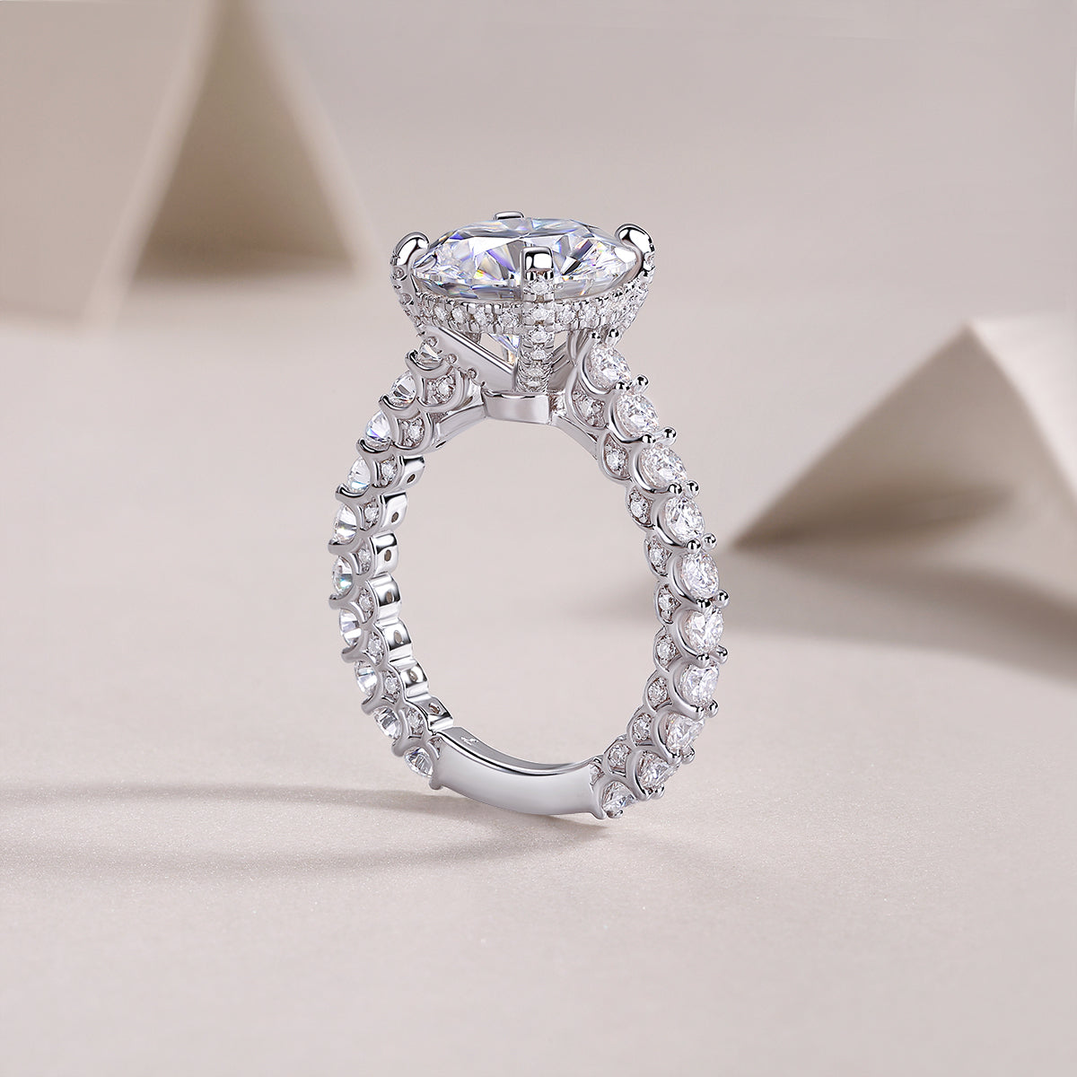 Round Moissanite Four-Prong Solitaire with Pave Band in 925 Silver