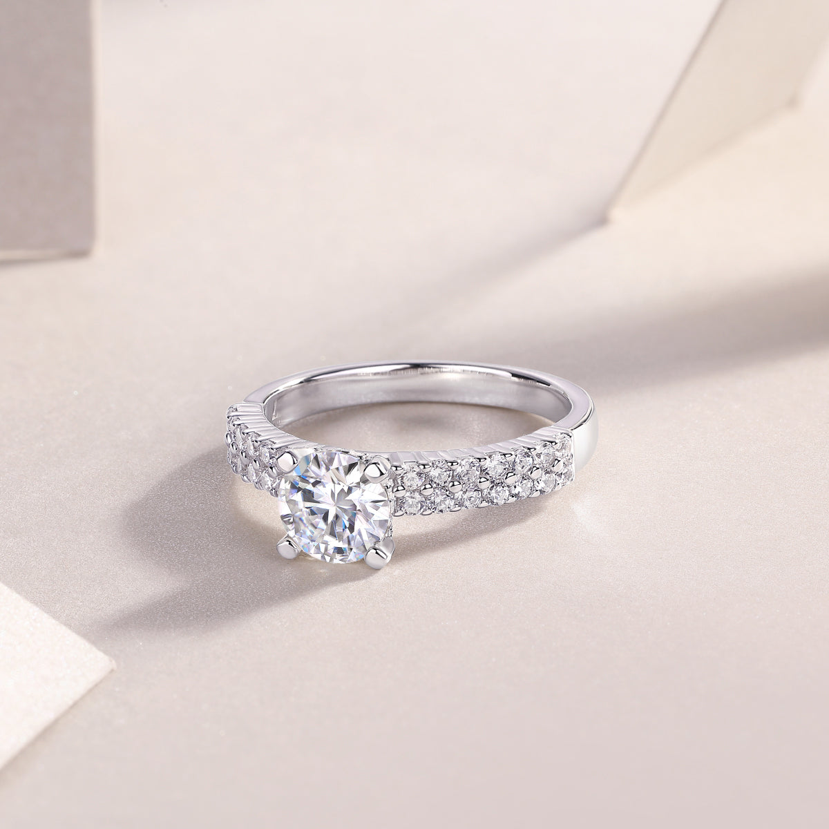 Round Moissanite Solitaire Ring with Shared-Prong Band in 925 Silver