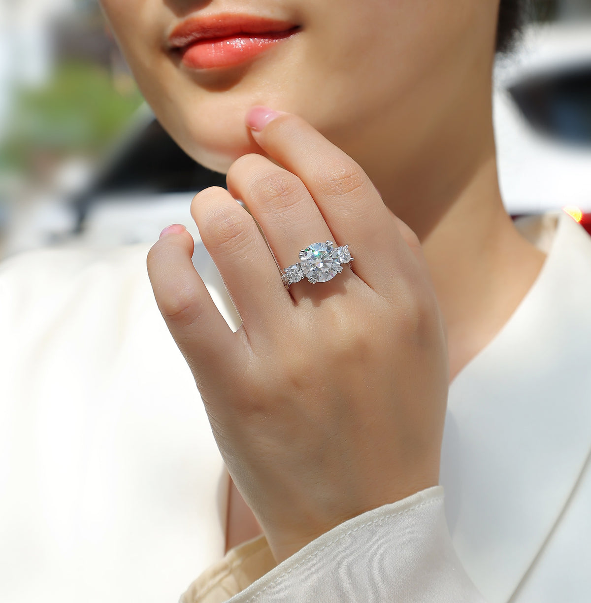 Round Moissanite Three-Stone Ring with Pave Band in 925 Sterling Silver - worn