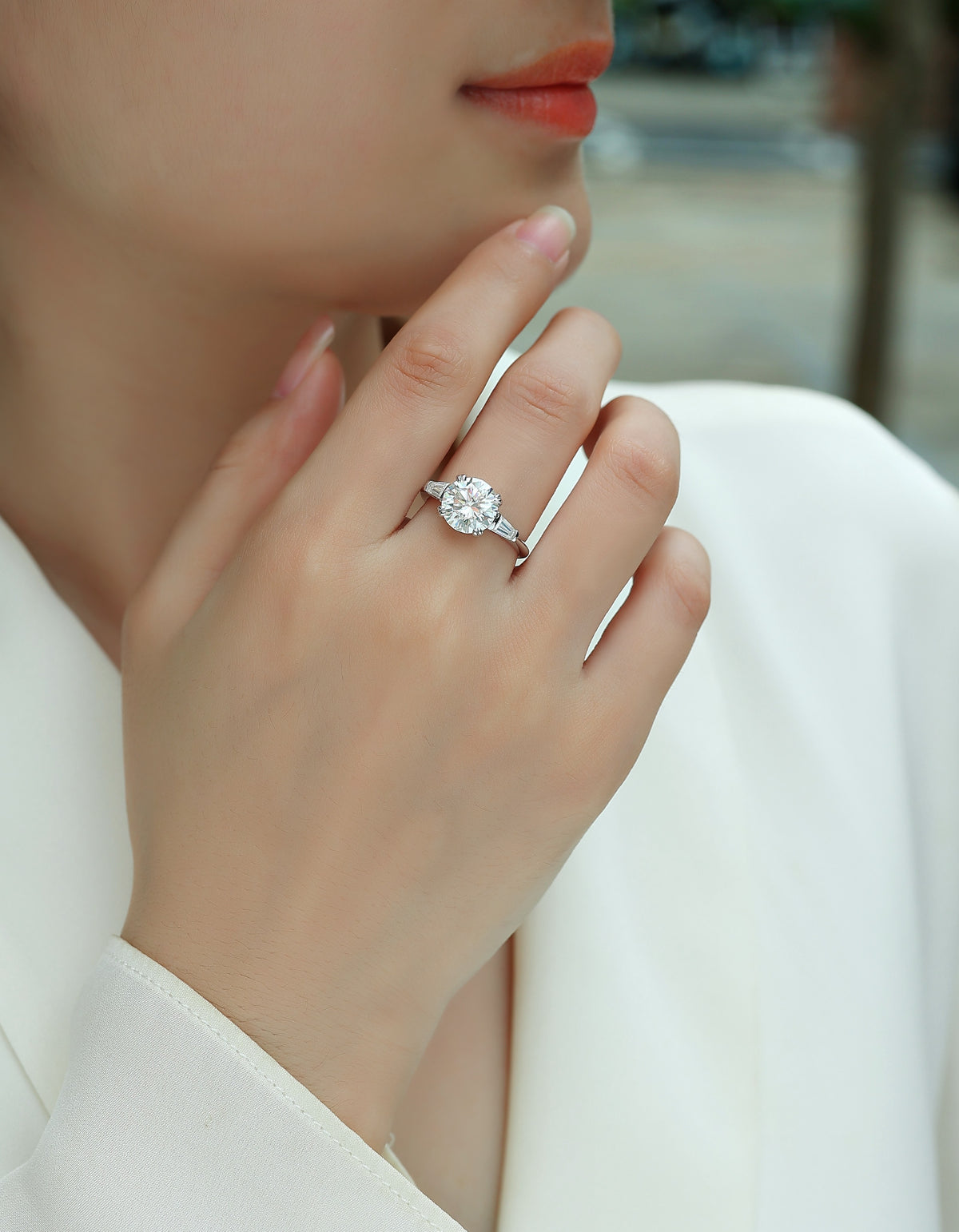 Round Moissanite Three-Stone Ring with Baguette Sides in 925 Silver - worn