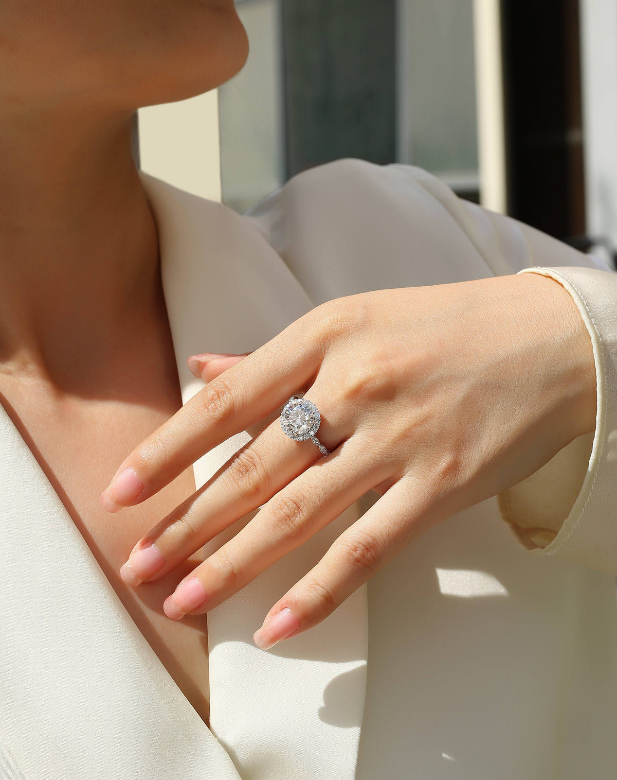 Round Moissanite Halo Ring with Twisted Pave Band in 925 Silver - worn