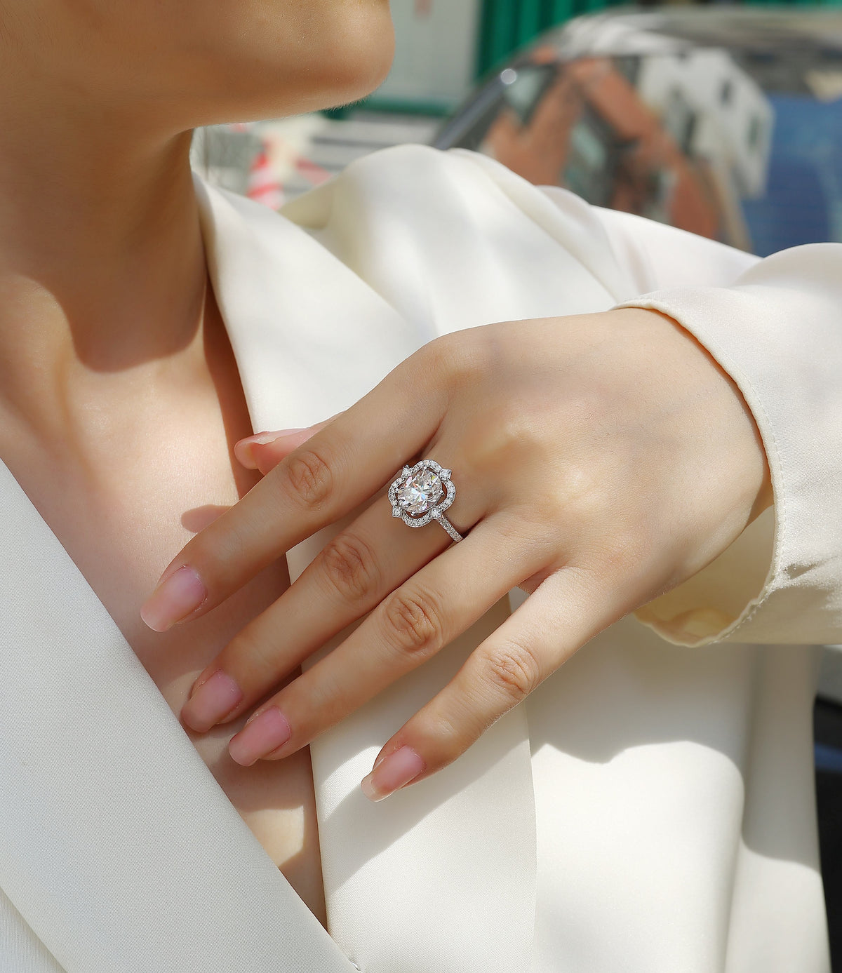 Oval Moissanite Ring with Floral Pave Halo in 925 Sterling Silver - worn