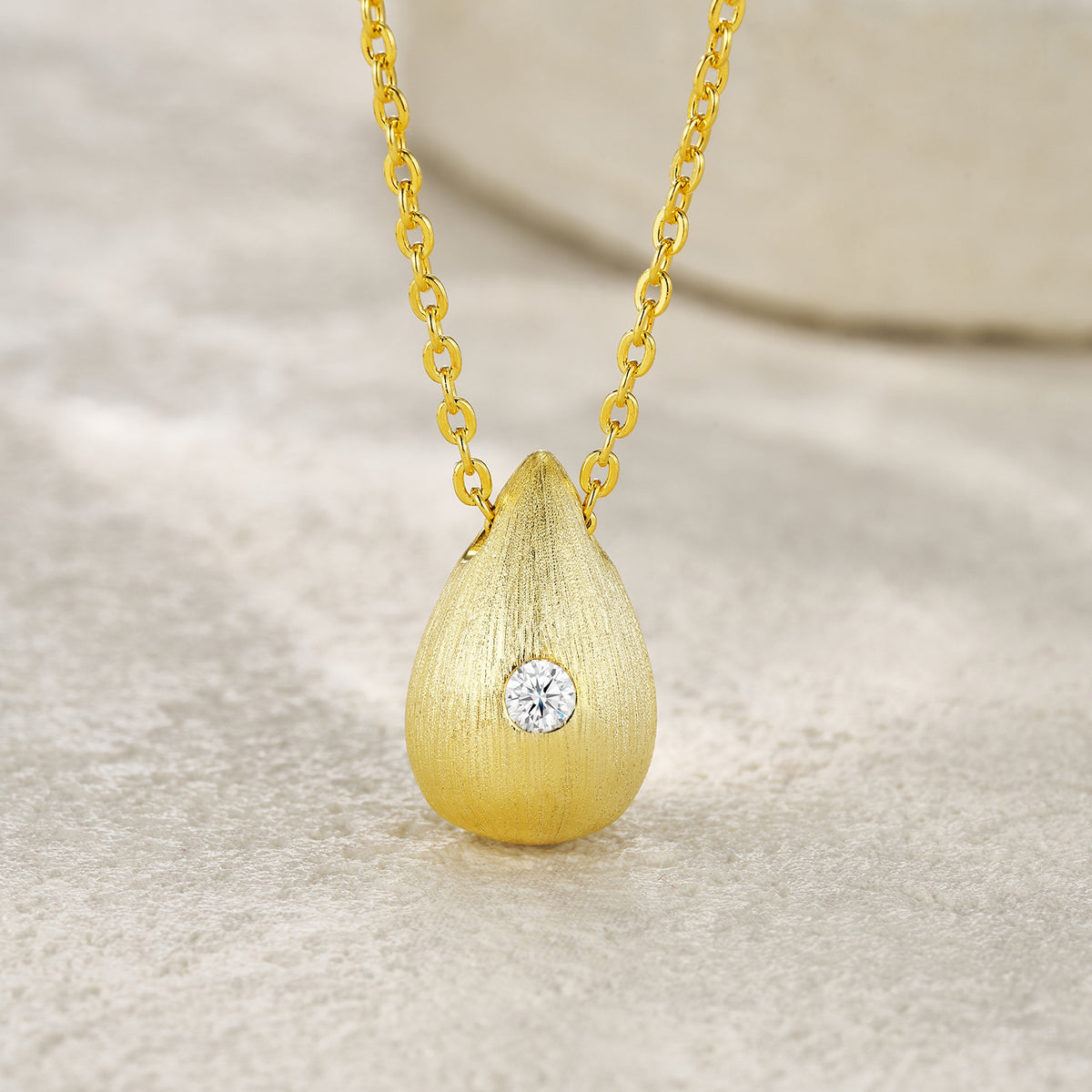 Moissanite Accent Polished Teardrop Pendant in Gold-Plated 925 Silver