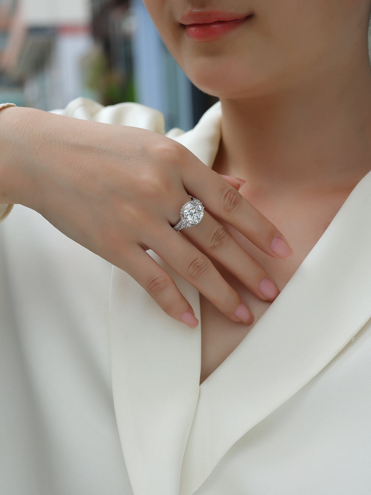 Round Moissanite Statement Ring with Side Stones and Pave Band in 925 Silver - worn