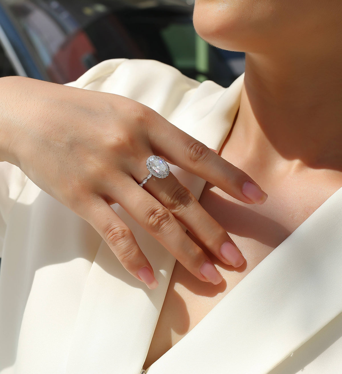 Oval Moissanite Halo Ring with Twisted Pave Band in 925 Silver - worn