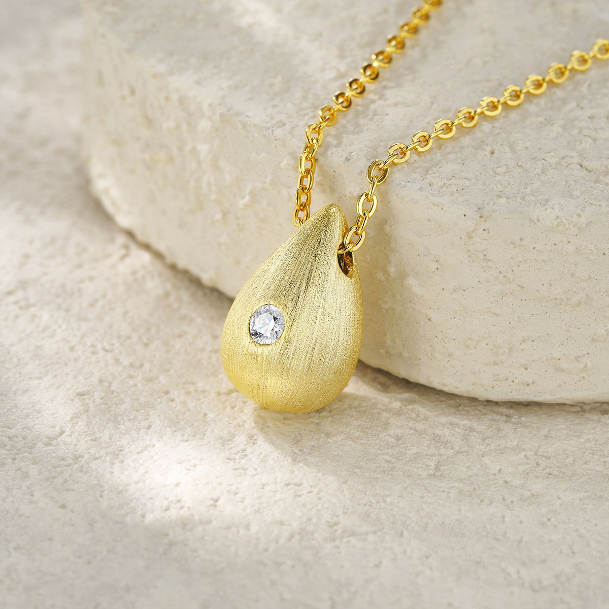 Moissanite Accent Polished Teardrop Pendant in Gold-Plated 925 Silver