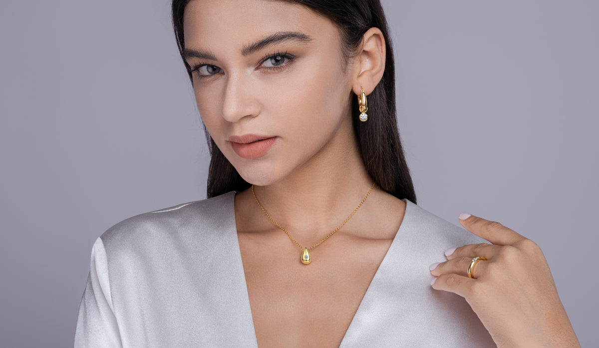 Moissanite Accent Polished Teardrop Pendant in Gold-Plated 925 Silver - worn
