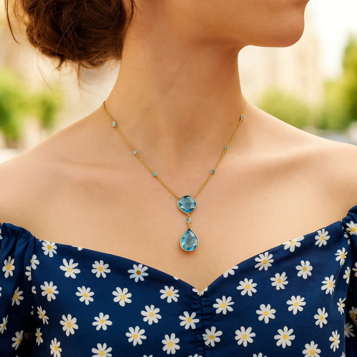 14k Yellow Gold Necklace with Pear-Shaped and Cushion Blue Topaz Briolettes