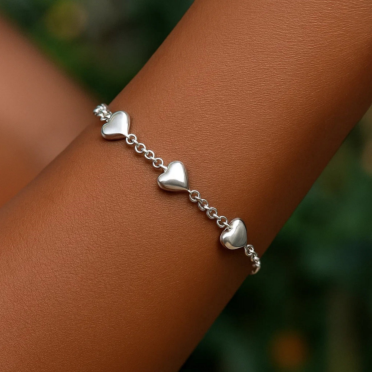Sterling Silver Rhodium Plated Puffed Triple Heart Bracelet