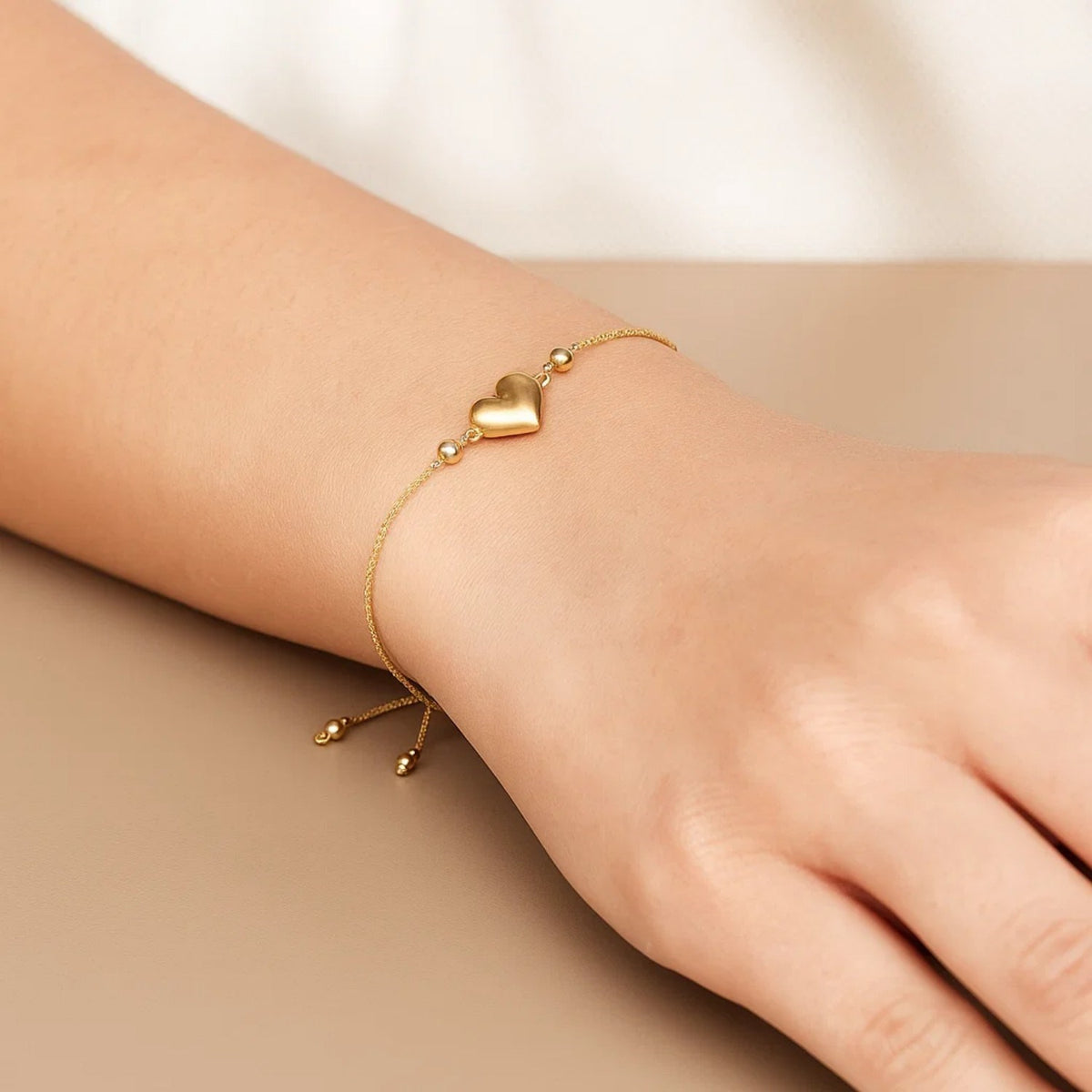 Adjustable Puffed Heart Draw String Bracelet in 14K Yellow Gold