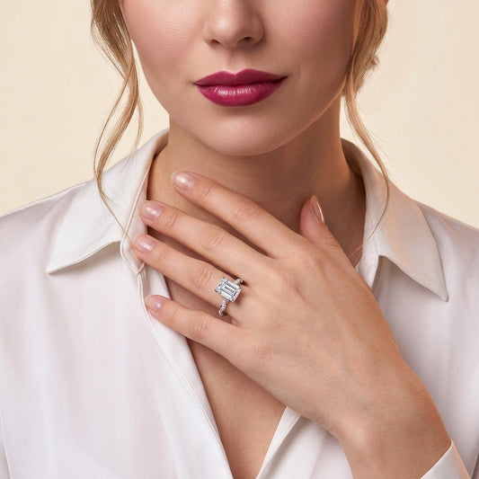 Emerald-Cut Moissanite Solitaire with Twisted Pave Band in 925 Silver - on model