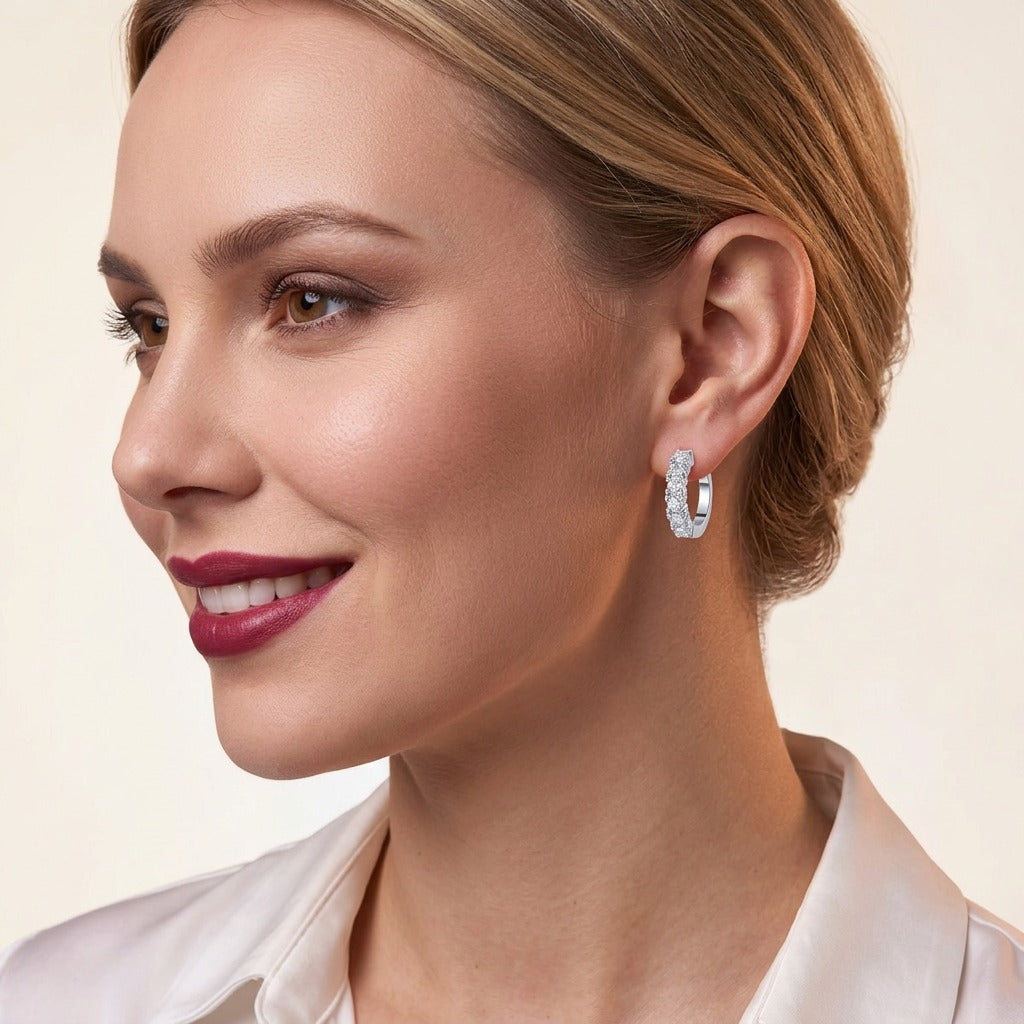 Round Moissanite Prong-Set Huggie Hoop Earrings in 925 Silver - on model