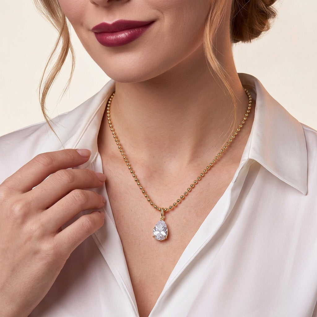 Pear Moissanite Pendant on Ball Chain in Gold-Plated 925 Silver - on model