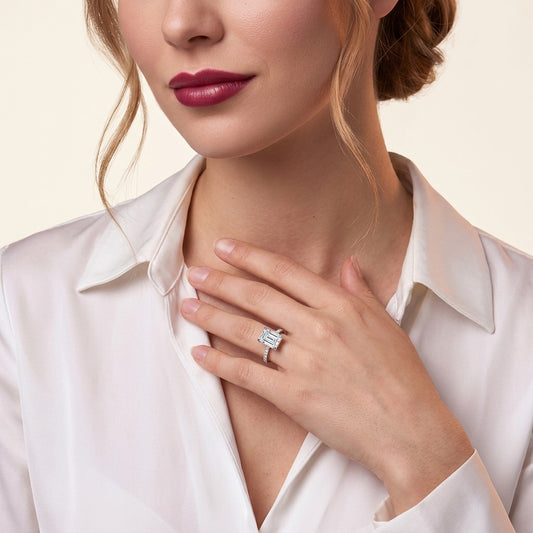 Emerald-Cut Moissanite Solitaire Ring with Pave Band in 925 Silver - on model