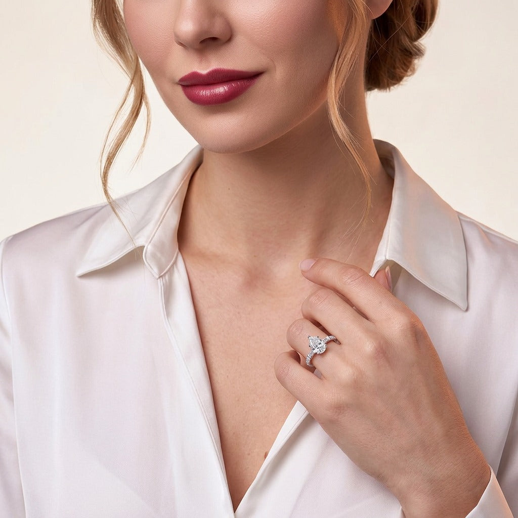 Pear Moissanite Ring with Baguette Side Stones in 925 Sterling Silver - on model