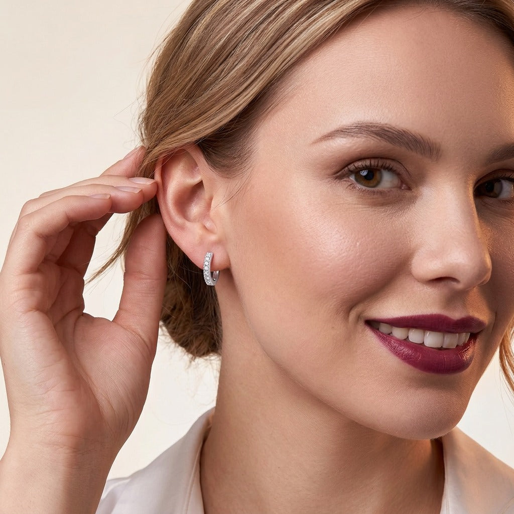 Moissanite Single-Row Pave Huggie Hoop Earrings in 925 Silver - on model