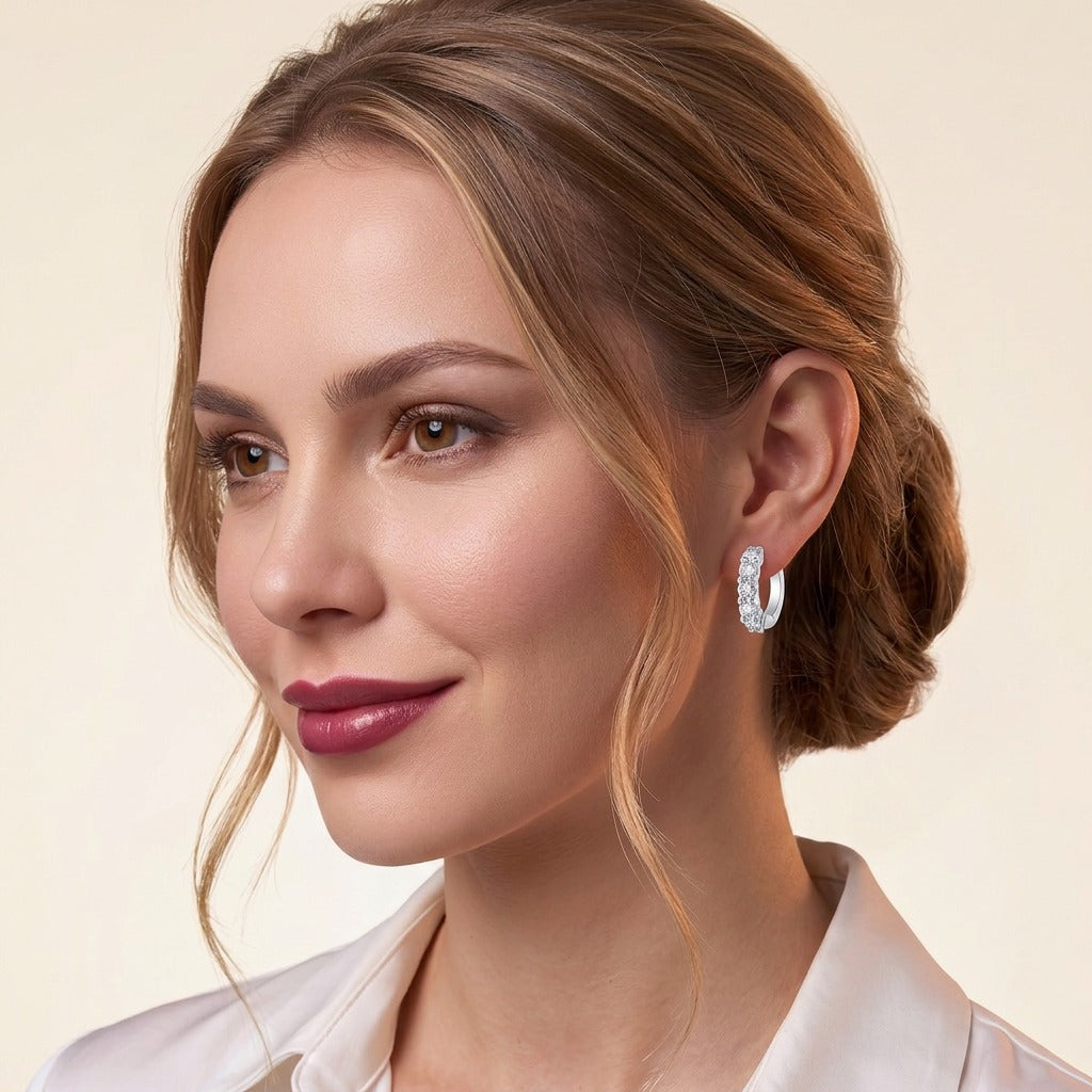 Round Moissanite Shared-Prong Huggie Hoop Earrings in 925 Silver - on model