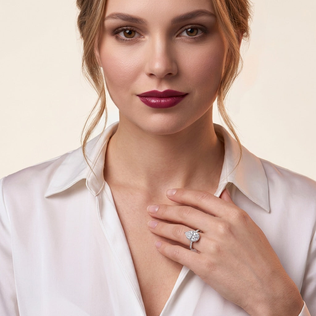 Pear Moissanite Hidden-Halo Solitaire Ring in 925 Sterling Silver - on model
