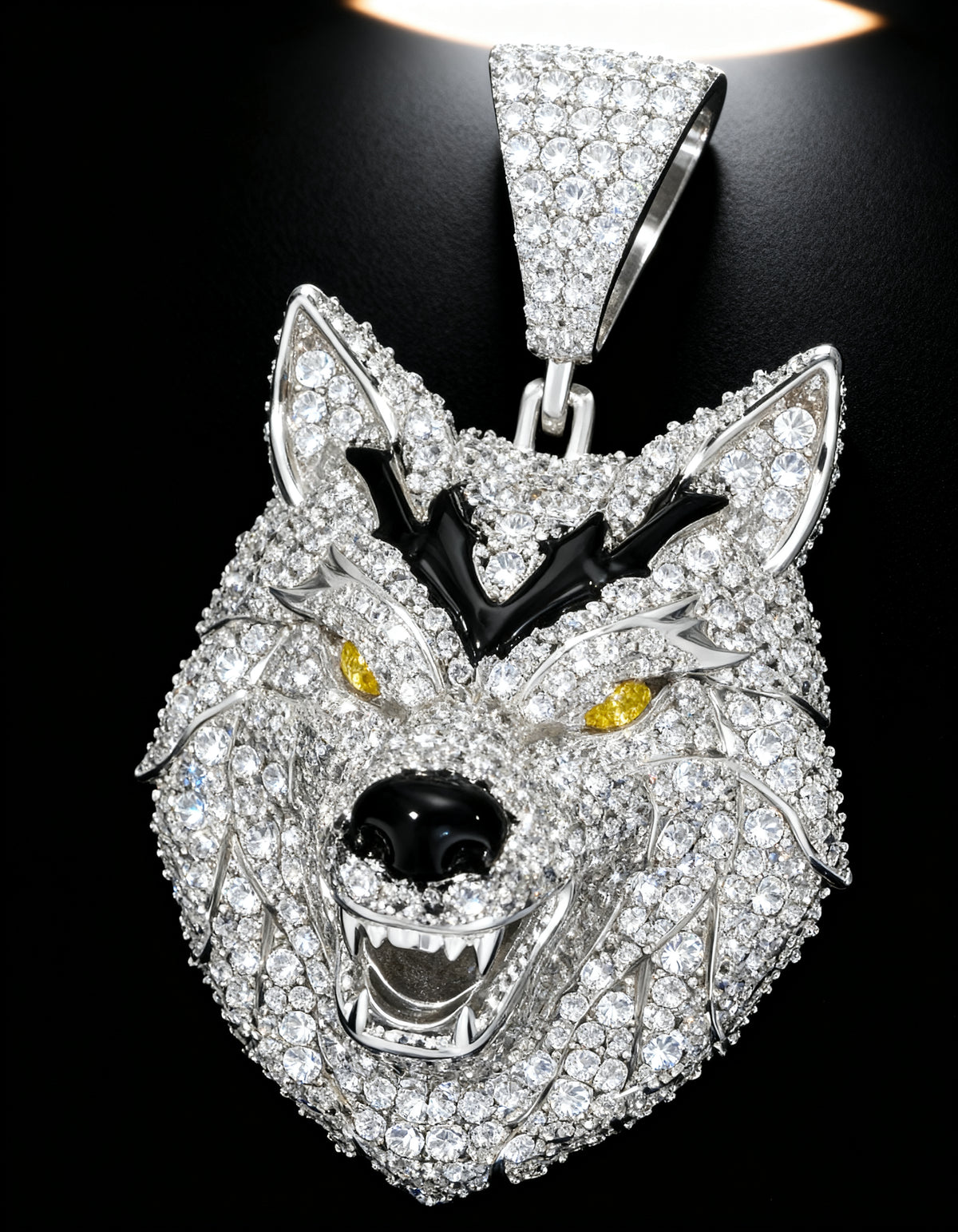 Iced Out 3D Wolf Head Pendant - close-up of the moissanite pave, black enamel and yellow eyes