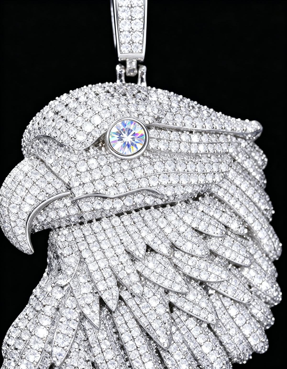 Iced Out Bald Eagle Pendant in 925 silver with moissanite - close-up of the clear faceted eye stone, beak and pave feathers
