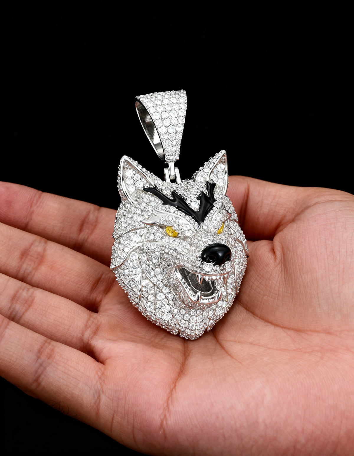 Iced Out 3D Wolf Head Pendant - three-quarter view in the palm
