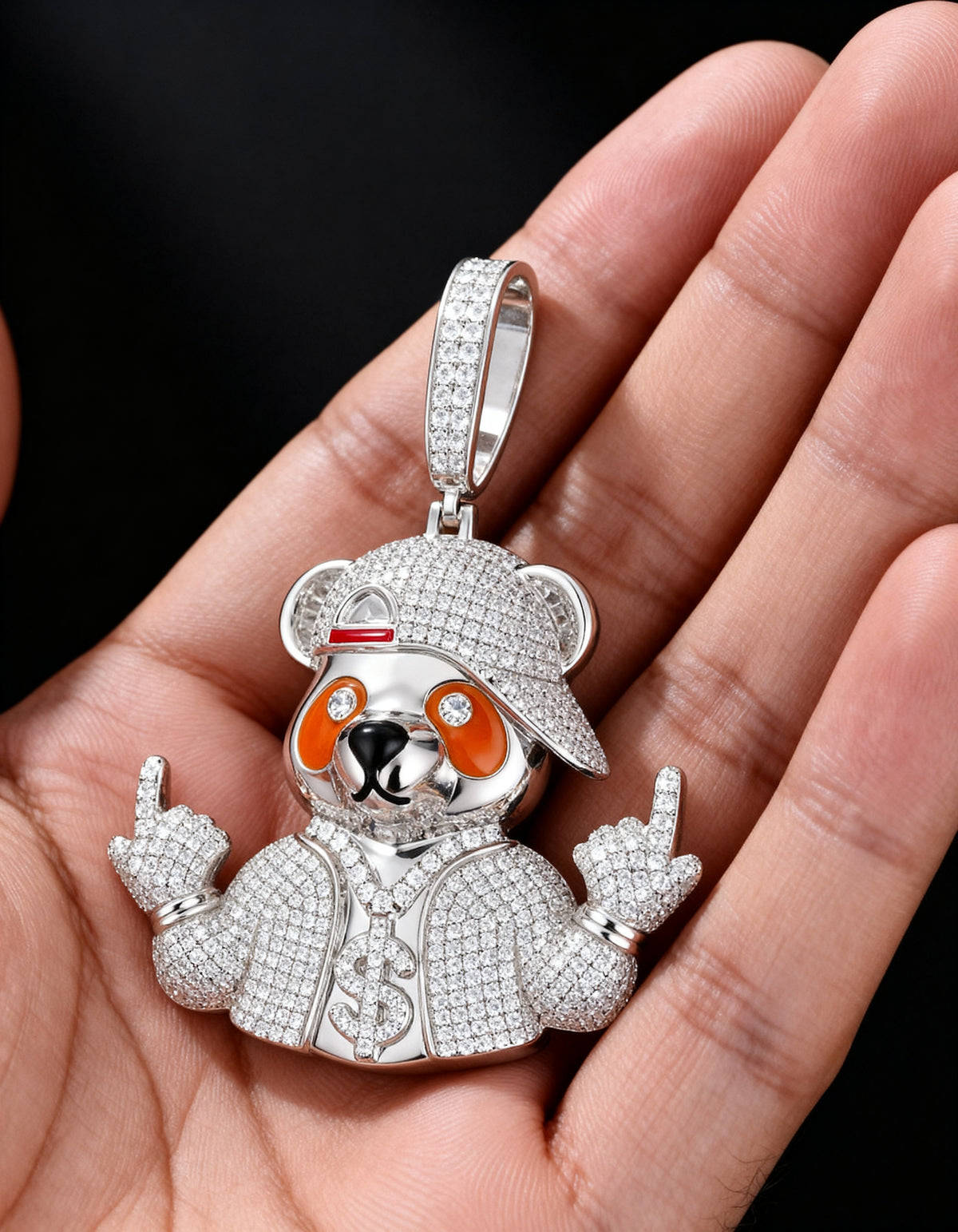 Iced Out Bear Pendant in 925 silver with moissanite - three-quarter view in the palm