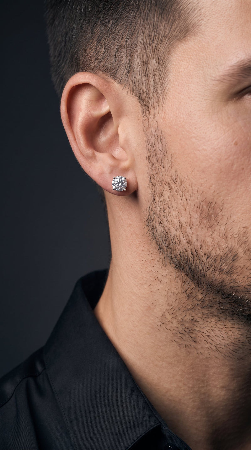 Close-up of a man's ear with a round moissanite stud earring